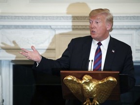 U.S. President Donald Trump speaks during a dinner for evangelical leaders in the State Dining Room of the White House, Monday, Aug. 27, 2018, in Washington.