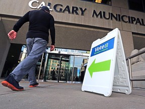 A voter heads into the City Hall polling station on Oct. 16, 2017.