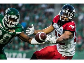 Calgary Stampeders wide receiver Juwan Brescacin (82) reaches for a pass during second half CFL action against the Saskatchewan Roughriders, in Regina on Sunday, August 19, 2018. The Saskatchewan Roughriders defeated the Calgary Stampeders 40-27.