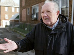 FILE - In this Nov. 20, 2003 file photo, Jakiw Palij, a former Nazi concentration camp guard, stands in front of a building in the Queens borough of New York. The White House says that Palij, a 95-year-old former Nazi concentration camp guard has been deported to Germany, 14 years after a judge ordered his expulsion. In a statement, the White House said the deportation of Palij, who lived in New York City, was carried out early Tuesday Aug. 21, 2018.