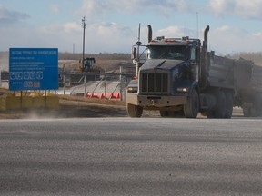 A truck leaves a gravel pit in northwest Calgary.