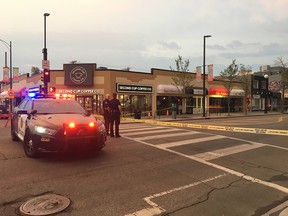 Calgary police at the scene of a suspected shooting in the 300 block of 10th ST. NW on Thursday, August 2.