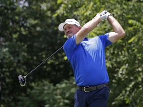 Jerry Kelly watches his tee shot on the fourth hole during the final round of the Constellation Senior Players Championship golf tournament at Exmoor Country Club in Highland Park, Ill., Sunday, July 15, 2018. (AP photo/Nam Y. Huh) ORG XMIT: ILNH106