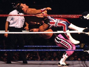 Bret "Hitman" Hart gives British Bulldog a German suplex during their match for the WWE Intercontinental Championship at SummerSlam 1992.