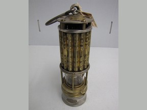 The RCMP are seeking public assistance in the return of a 1900s coal miners lamp, a replica of which is shown in a handout photo, that was removed on July 28 from a historical site at Lower Bankhead near Lake Minnewanka in Banff National Park.