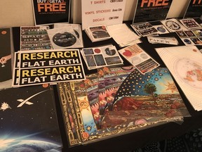 Edmonton played host to what's being billed as Canada's first "flat earth" conference this week. A merchandise table was loaded with stickers and posters with flat earth slogans.