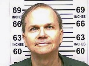 FILE- This Jan. 31, 2018 photo, provided by the New York State Department of Corrections, shows Mark David Chapman, the man who killed John Lennon on Dec. 8, 1980. The New York State Parole Board has denied Chapman, 63, parole for a 10th time on Thursday, Aug. 23, 2018. He will be eligible for parole again in 2020. (New York State Department of Corrections via AP)