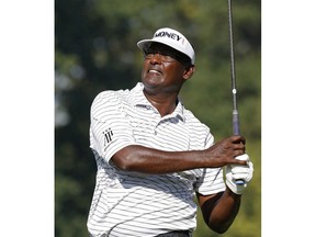 Vijay Singh, of Fiji, watches his tee shot on the fifth hole during the first round of the PGA Championship golf tournament at Bellerive Country Club, Thursday, Aug. 9, 2018, in St. Louis.