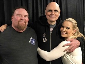 From left, my dad Jim Neidhart, Billy Corgan and myself backstage at the Smashing Pumpkins concert in Tampa, Fla., July 25, 2018.