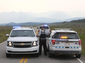 RCMP investigate after a motorist was shot while driving on Highway 1A near Morley on Thursday, August 2, 2018.