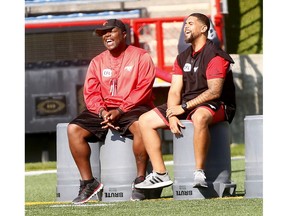 Calgary Stampeders defensive coordinator, DeVone Claybrooks was back at practice after health issues at McMahon stadium in Calgary on Friday. Photo by Darren Makowichuk/Postmedia.