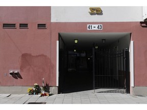 Flowers and condolences are left at the scene where a 20-year-old disabled man was shot and killed by police, in Stockholm, Friday, Aug. 3, 2018. (Janerik Henriksson/TT News Agency via AP)