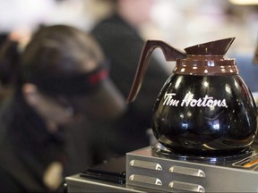 Freshly-brewed coffee sits on a hot plate in a Tim Hortons outlet in Oakville, Ont. on Sept.16, 2013. (THE CANADIAN PRESS/Chris Young)