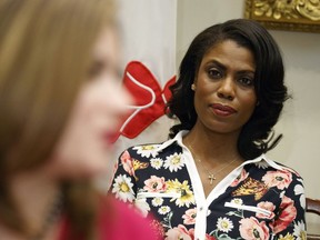 In this Feb. 14, 2017, file photo, Omarosa Manigault-Newman, then an aide to U.S. President Donald Trump, watches during a meeting with parents and teachers in the Roosevelt Room of the White House in Washington.