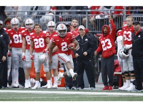 COLUMBUS, OH - SEPTEMBER 08: J.K. Dobbins #2 of the Ohio State Buckeyes run the ball down the sideline in the second quarter of the game against the Rutgers Scarlet Knights at Ohio Stadium on September 8, 2018 in Columbus, Ohio.