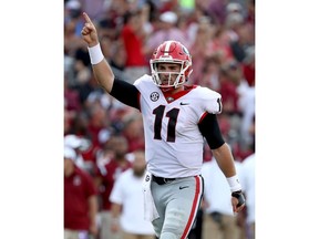 Jake Fromm #11 of the Georgia Bulldogs reacts after a touchdown against the South Carolina Gamecocks during their game at Williams-Brice Stadium on September 8, 2018 in Columbia, South Carolina.