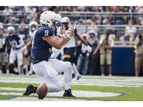 STATE COLLEGE, PA - SEPTEMBER 15: Trace McSorley #9 of the Penn State Nittany Lions celebrates after scoring a touchdown against the Kent State Golden Flashes during the first half at Beaver Stadium on September 15, 2018 in State College, Pennsylvania.