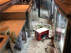 Security footage from early Sunday morning shows three culprits destroying the front windows of Union 26 bar in Rundle, breaking into a room through a wall, damaging all Alberta Gaming and Liquor Commission-owned video lottery terminals and breaking four televisions. (Union 26/Facebook)