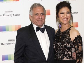 In this Dec. 2, 2017 file photo, Les Moonves, left, and his wife Julie Chen arrive for the Kennedy Center Honors gala dinner in Washington. (AP Photo/Kevin Wolf, File)