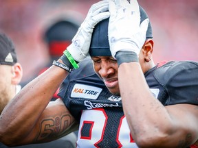 Calgary Stampeders Kamar Jorden is helped off the field after suffering leg injury against the Edmonton Eskimos during the Labour Day Classic in Calgary on Monday, September 3, 2018. Al Charest/Postmedia