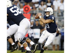 Penn State quarterback Trace McSorley (9) scrambles out of the pocket against during the second half of an NCAA college football game against Appalachian State in State College, Pa., Saturday, Sept. 1, 2018. Penn State won 45-38 in overtime.