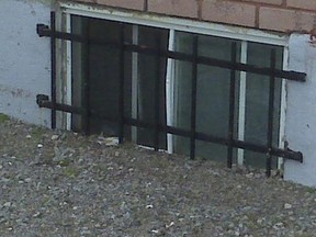 Barred basement window