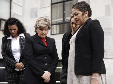 Attorney Gloria Allred, center, waits to speaks with members of the media during a recess in Bill Cosby's sentencing hearing at the Montgomery County Courthouse, Monday, Sept. 24, 2018, in Norristown Pa.