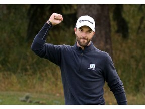 Marc-Etienne Bussieres celebrates his final putt on the18th hole winning the PGA Assistants' Championship of Canada at The Winston Golf Club in Calgary on Wednesday. Photo by Gavin Young/Postmedia.