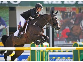 Canada's Kara Chad riding Viva won the ATCO Founders Classic on day two at the Spruce Meadows Masters on Thursday September 6, 2018.  Gavin Young/Postmedia
