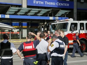 Emergency personnel and police respond to reports of an active shooter situation near Fountain Square, Thursday, Sept. 6, 2018, in downtown Cincinnati.