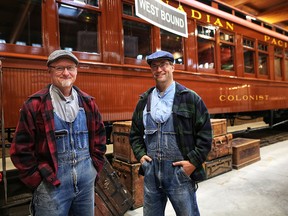 Mike Willie and Doug Zech, photographed on Sept. 20, 2018, in front of the 1905 Colonist Car they restored at Heritage Park.