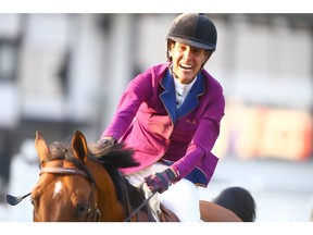 Luciana Diniz, from Portugal, on horse Camargo 2, reacts after jumping clear in the jump off to win the Tourmaline Oil Cup at Spruce Meadows in Calgary on Friday, September 7 2018. Jim Wells/Postmedia