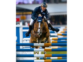 Holger Wulschner, from Germany, rides Zuckersuess D'Argilla during the Atco Six Bar event at Spruce Meadows in Calgary on Friday, September 7, 2018. Jim Wells/Postmedia