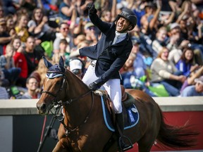 Egypt's Sameh El Dahan riding Suma's Zorro celebrates his victory during the CP International competition at the Spruce Meadows Masters in Calgary, Alta., Sunday, Sept. 9, 2018.THE CANADIAN PRESS/Jeff McIntosh ORG XMIT: JMC110