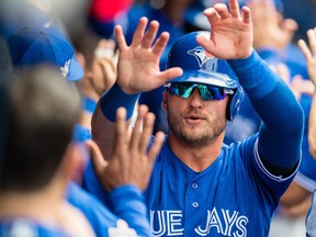 Josh Donaldson of the Toronto Blue Jays celebrates after scoring off a single by Yangervis Solarte during the fourth inning against the Cleveland Indians at Progressive Field on May 3, 2018 in Cleveland, Ohio. (Jason Miller/Getty Images)