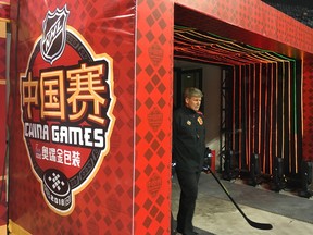 Flames head coach Bill Peters prior to first practice at Shenzhen Universiade Sports Center.
