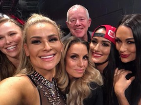 Fit Finlay (back) with Ronda Rousey, Nattie Neidhart, Trish Stratus and Nikki and Brie Bella backstage at Monday Night Raw in Toronto.