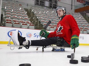 Paralyzed Humboldt Broncos player Ryan Straschnitzki takes to the ice to practice his sledge hockey skills in Calgary on Tuesday, Aug. 7, 2018.