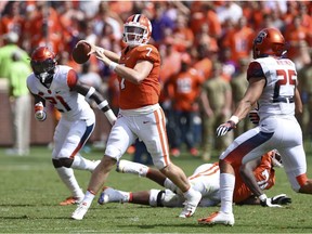 Clemson quarterback Chase Brice throws a pass during the second half of an NCAA college football game against Syracuse Saturday, Sept. 29, 2018, in Clemson, S.C. Clemson won 27-23.