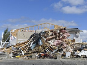 Houses on Porcupine Trail and Casey Creek Lane neighbourhood in Dunrobin are destroyed by the tornado that hit the region Friday, Sept. 21, 2018.