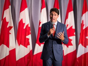 Prime Minister Justin Trudeau addresses supporters at a Liberal Party fundraiser, in Surrey, B.C., on Tuesday September 4, 2018. THE CANADIAN PRESS/Darryl Dyck