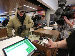 The first customer at Nova Cannabis purchased Blue Dream at the store in Calgary, on Wednesday October 17, 2018. Leah Hennel/Postmedia