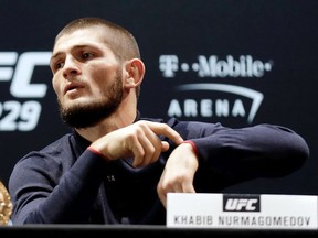 UFC lightweight champion Khabib Nurmagomedov remarks on a tardy Conor McGregor (not pictured) during a press conference for UFC 229 at Park Theater at Park MGM on October 04, 2018 in Las Vegas, Nevada.