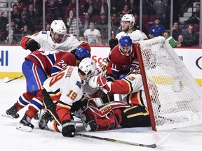 Goaltender David Rittich was under siege much of the night during Tuesday's match between the Montreal Canadiens and Calgary Flames in Montreal.