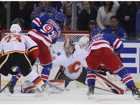 David Rittich of the Calgary Flames tends net against the New York Rangers during the third period at Madison Square Garden on Oct. 21, 2018 in New York City. The Flames defeated the Rangers 4-1.