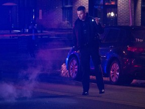 Calgary police investigate a shooting in the 1000 block of 17th Ave. S.W. on Oct. 10, 2018. Two men were taken to hospital in stable condition.