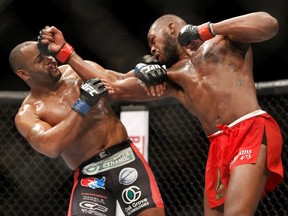 Light heavyweight champion Jon Jones (R) punches Daniel Comier during the UFC 182 event at the MGM Grand Garden Arena on January 3, 2015 in Las Vegas, Nevada. Jones retained his title by unanimous decision. (Steve Marcus/Getty Images)