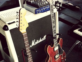 A 1966 Fender Stratocaster guitar and a 1966 Gibson Trini Lopez are seen in an undated handout photo.