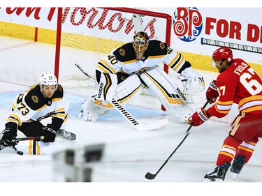 The Calgary Flames Michael Frolik scores during NHL action against the Boston Bruins at the Scotiabank Saddledome in Calgary on Wednesday October 17, 2018.