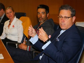 Pictured from left to right: Mary Moran, Brian McKeever, and Scott Hutcheson, board chair of the Calgary 2026 Olympic Bid Corporation during an editorial board meeting with the editors and journalist of Postmedia Calgary on Thursday, October 18, 2018. Al Charest/Postmedia